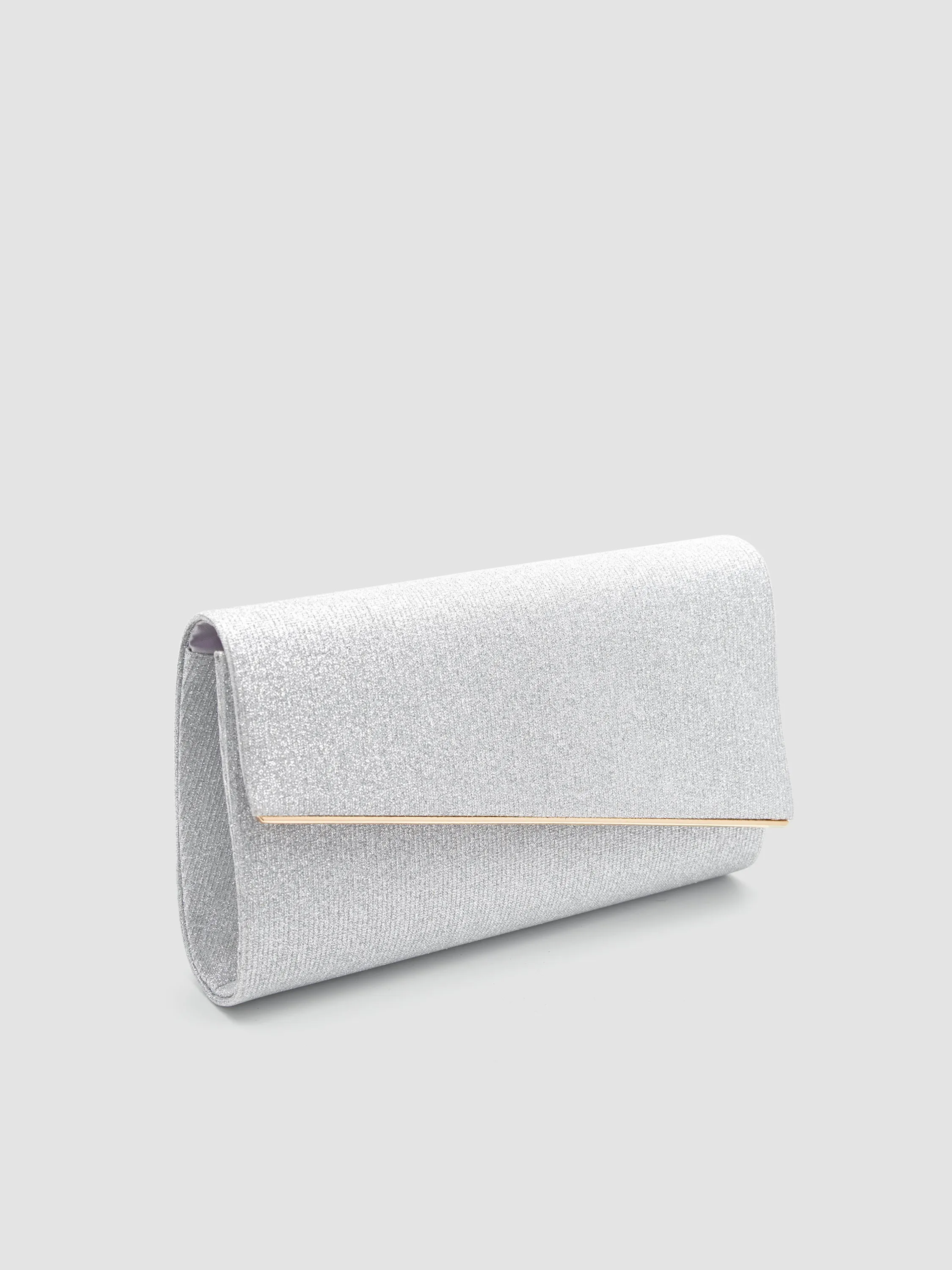 Asymmetrical Flapover Clutch With Metal Trim