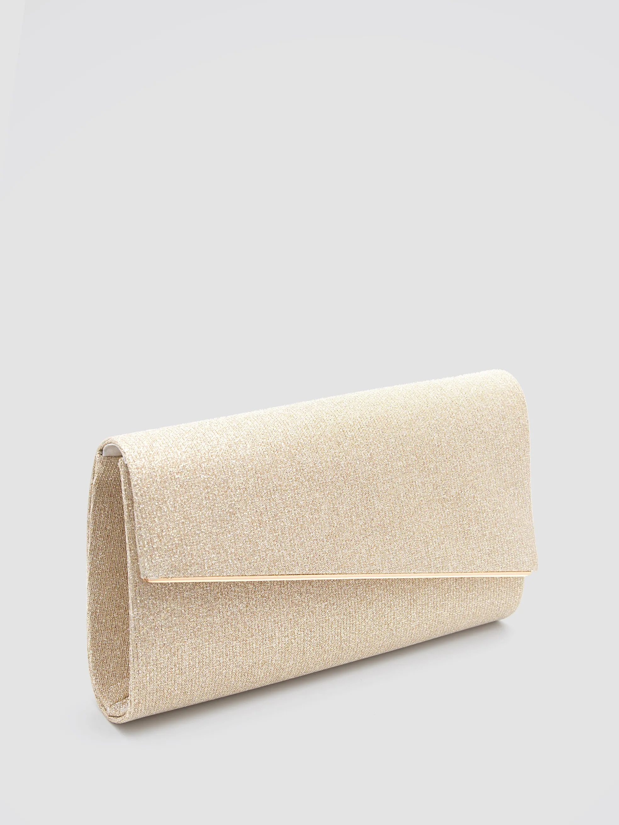 Asymmetrical Flapover Clutch With Metal Trim