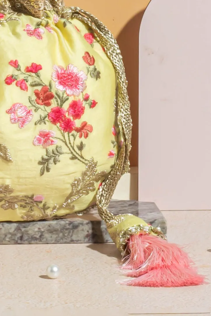 Reet floral embroidered potli - pastel yellow